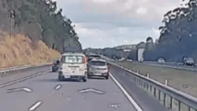 Pro fighter breaks up road rage on Queensland highway