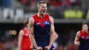 Demons beat Suns by nine points to cement AFL top six spot